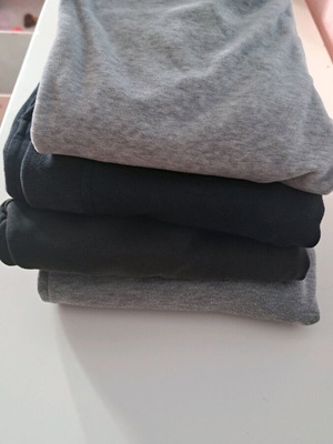 Pack of 4 girls' tracksuits used, black and grey, ages 7-9