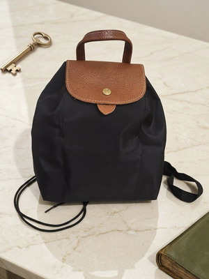 Smart foldable backpack like new, black with brown details