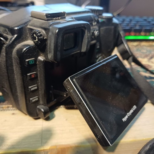 Olympus E-330 DSLR camera used with Zuiko Digital 14-45mm lens