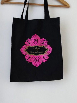 Fabric shoulder bag like new, black with print