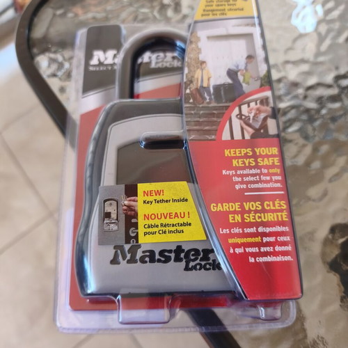 Master Lock padlock with key storage and combination