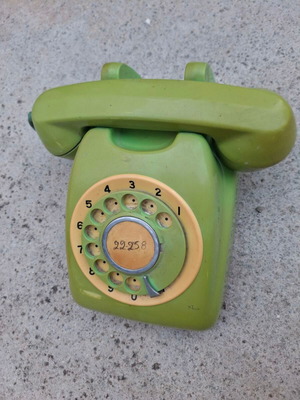 Vintage green rotary dial telephone used