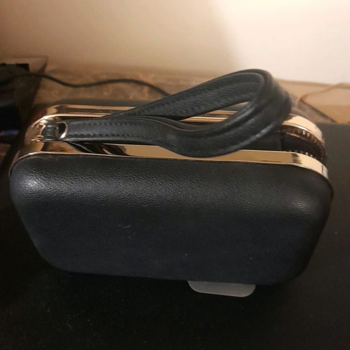 Small hard bag with zipper and small handle blue new