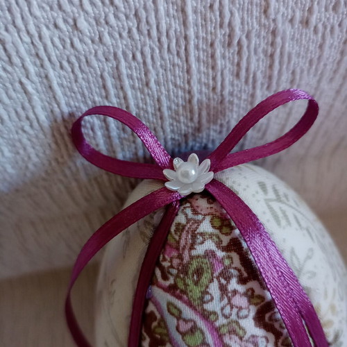 Decorative pink lilac floral egg used for Easter and spring decor