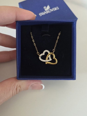 Swarovski necklace new, two hearts gold and silver
