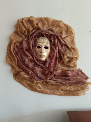 Handmade 3D wall decoration with theatrical mask used