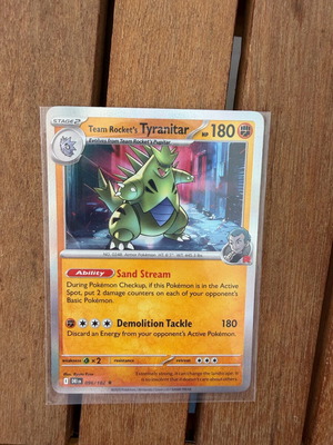 Team Rocket’s Tyranitar 096/182 reverse holo new