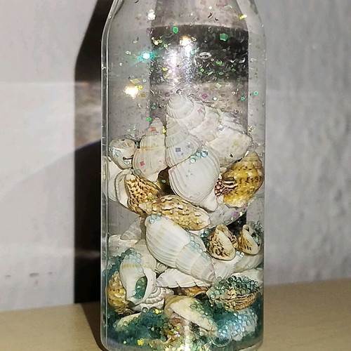 Bottle opener from Limnos like new with shells and glitter