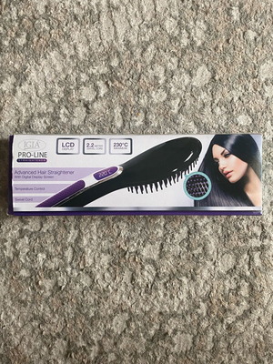 Hot hair straightening brush like new with LCD display and 2.2m cord