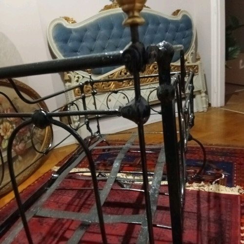 Baby cradle old handmade iron with bronze details refurbished