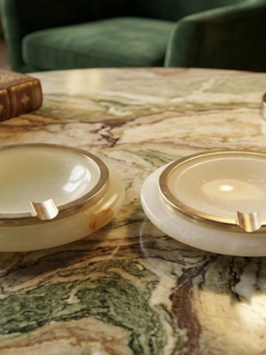 Pair of vintage onyx ashtrays with gold details