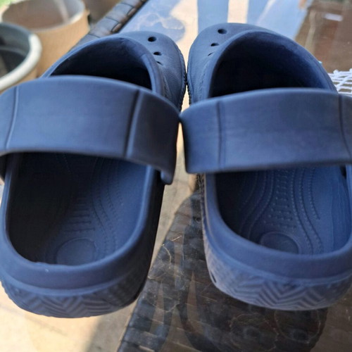 Kids Cros slippers size 25 like new, blue with fire truck figure