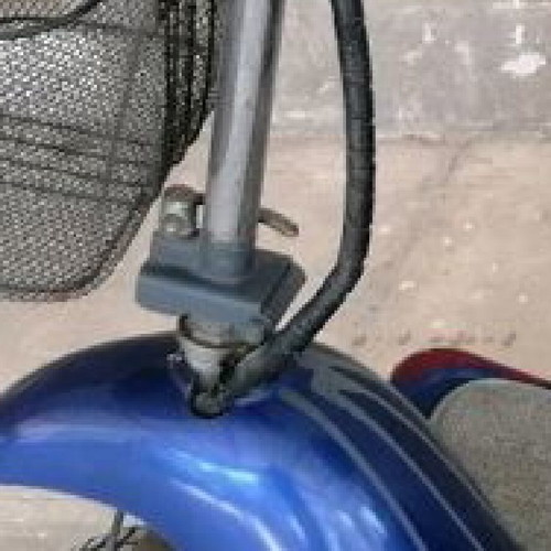 Electric three-wheeler used with two baskets and hill assist