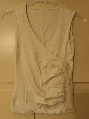 Sleeveless blouse like new, beige with embroidery and ruching