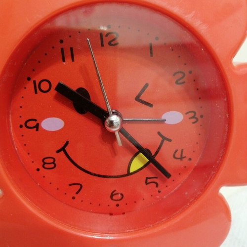 Flower alarm clock used with second hand, battery operated