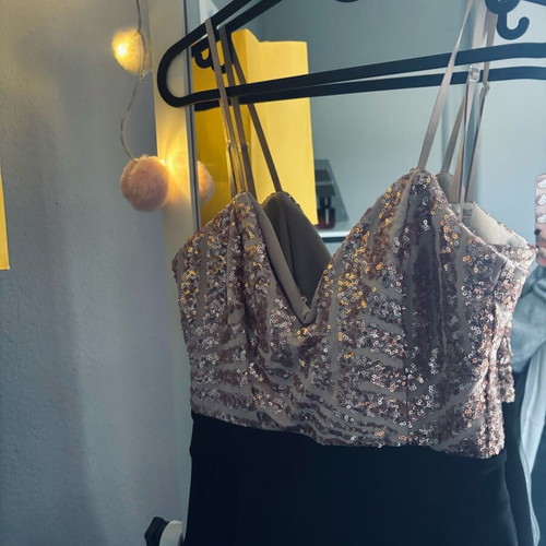 One-piece jumpsuit used, pink sequin top, flared pants, size S-M