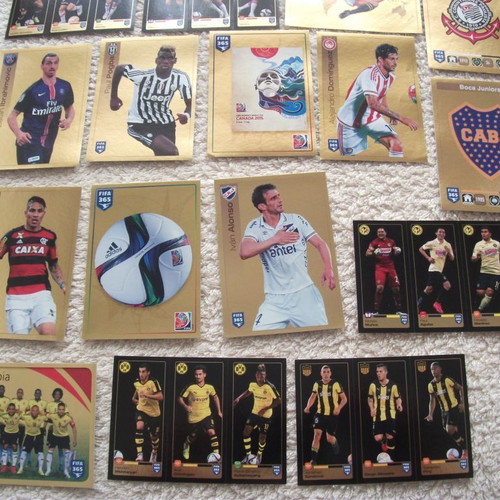 Panini FIFA 365 stickers like new, set of 32 with gold accents