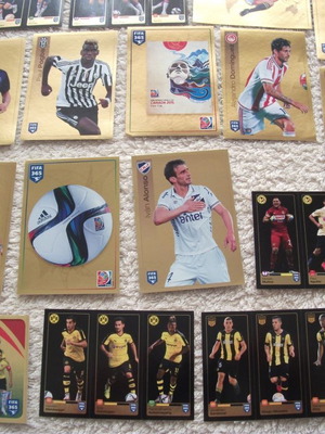 Panini FIFA 365 stickers like new, set of 32 with gold accents