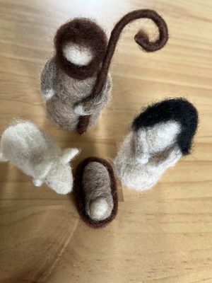 Woolen nativity scene with Mary, Joseph, baby Jesus and lamb