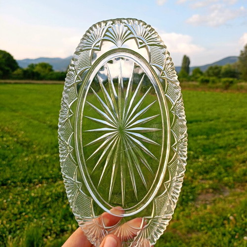 Glass serving plate unused with carved design