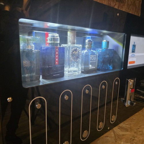 Automatic perfume vending machine with touchscreen and coin acceptor