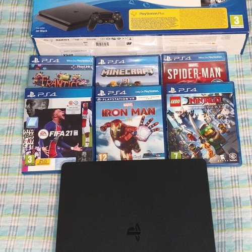 PlayStation 4 console 500GB with 6 games, no controller