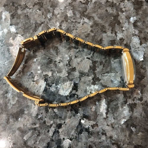 Women's wristwatch used, black and gold, 22cm bracelet