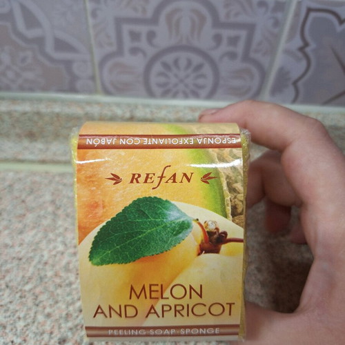 Body peeling soap and sponge new with melon and apricot extract