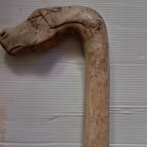 Wooden carved walking stick used with horse head handle