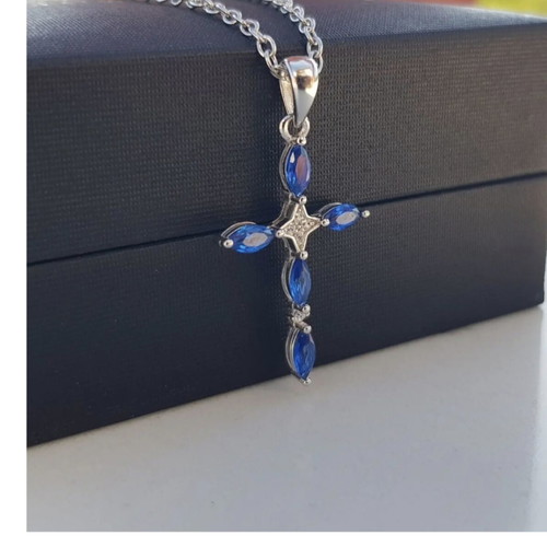 Women's silver cross pendant with blue cubic zirconia