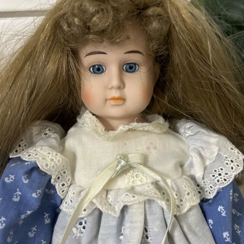 Porcelain doll Germany from the 70s like new