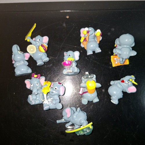 Elephant figurine collection used from Kinder Surprise with damages