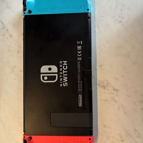 Nintendo Switch V2 console used with 2 games and carrying case