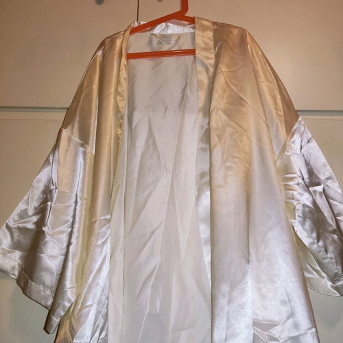 2 women's robes like new, one cream and one black with flower detail
