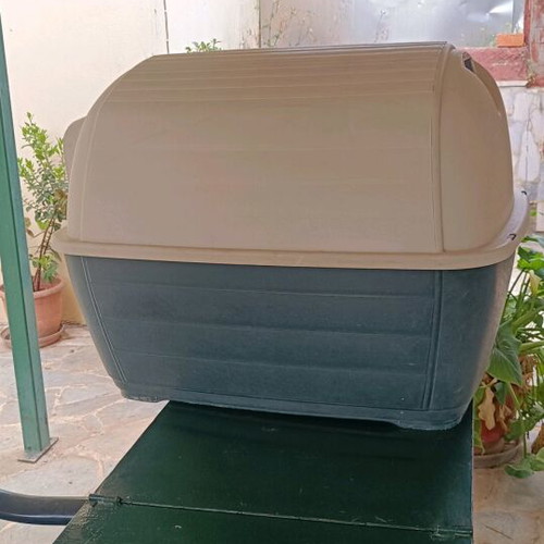 Dog house used with missing front side and durable dog bed