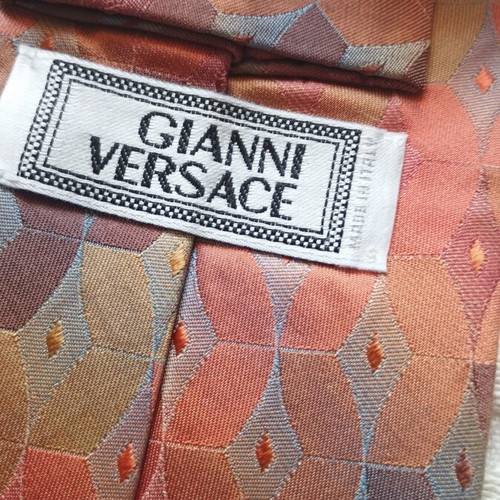 Gianni Versace tie like new, 100% silk, geometric diamond pattern