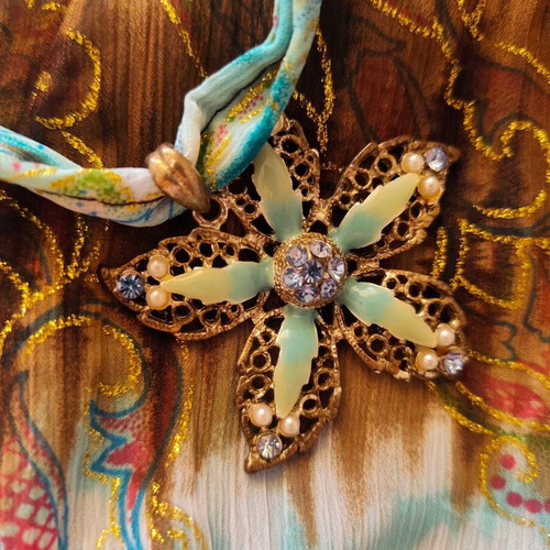 Fairycore forest-inspired top with asymmetric flower brooch, turquoise and brown