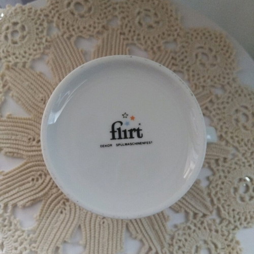 Flirt milk jug like new with orange design