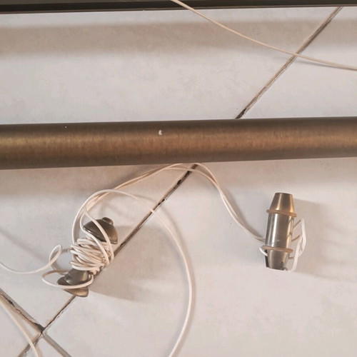 Bronze curtain rods like new with manual mechanism and rail