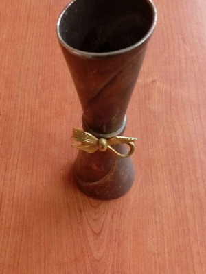 Vintage metal vase with brass decoration used