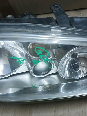 VW Golf 4 right headlight Valeo used, halogen projector lamp
