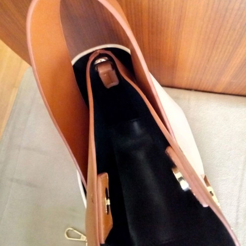 Small bag used with tan and ecru strap