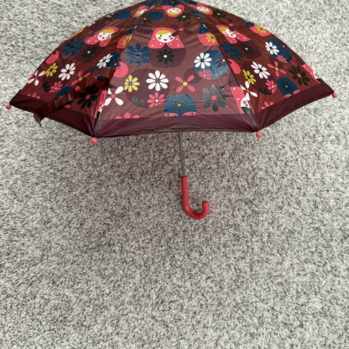 Children's umbrella with matryoshka dolls and flowers used