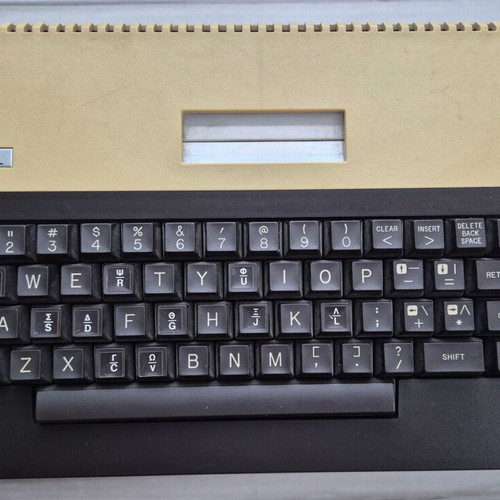 Atari 800XL console with original power supply, functional