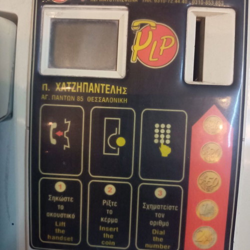 Coin-operated phone like new