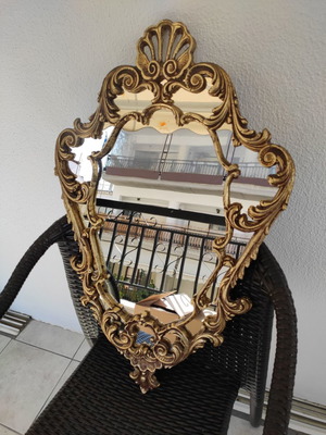 Entrance mirror used with marble and iron shelf