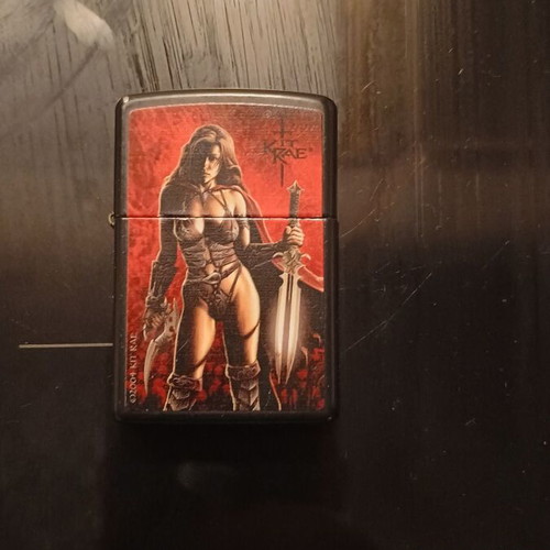 Zippo used collectible lighter with Rae design