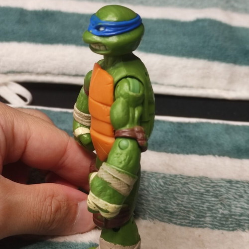 Leonardo Teenage Mutant Ninja Turtle figure used, missing shell