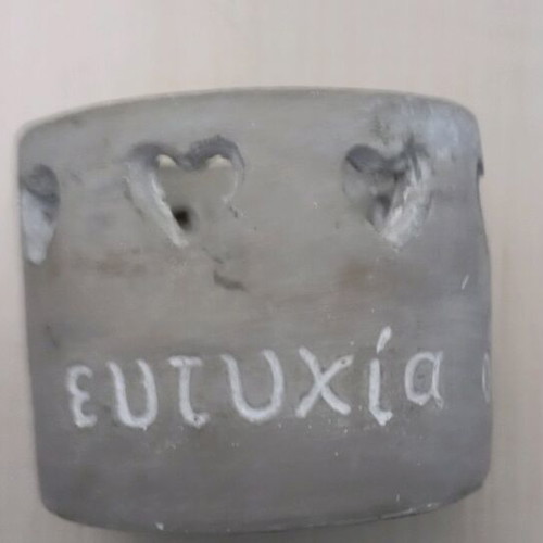 Handmade cement candle holder like new with pierced heart design