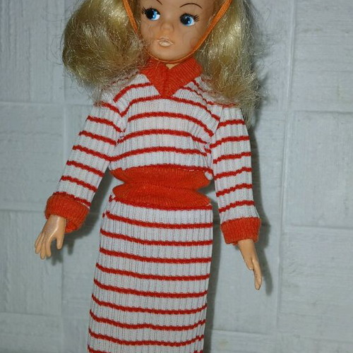 Sindy Pedigree doll used with dress, shoes, hat, and stand